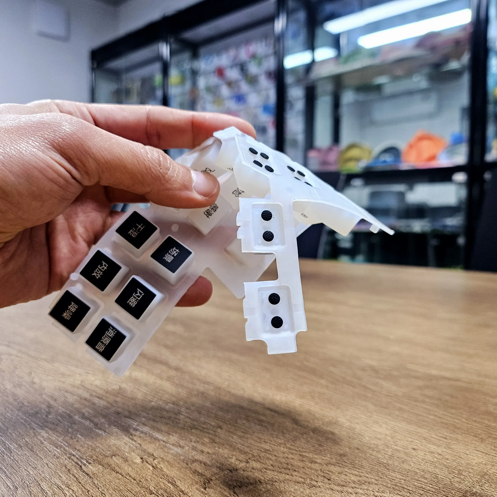 Custom silicone keypads and switches with carbon contacts