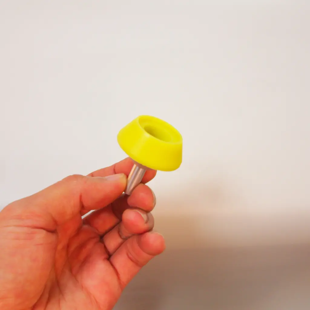 Silicone liner overmolded onto metal substrate